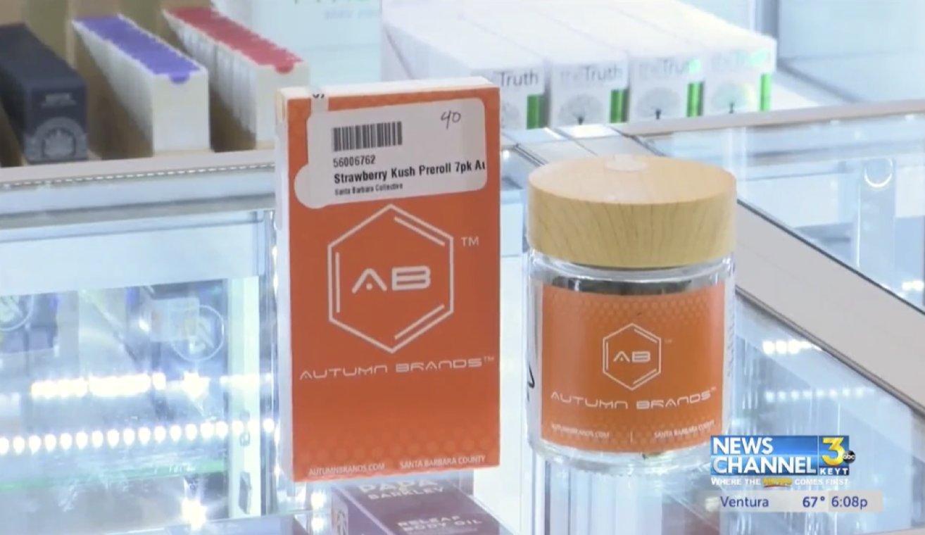 Autumn Brands pre-roll box and flower jar on a dispensary counter in a KEYT NewsChannel 3 broadcast