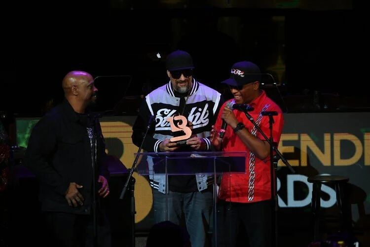 Presenters at the podium during the Budtender Awards show