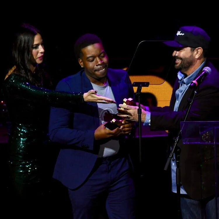 Award being presented on stage at the Budtender Awards