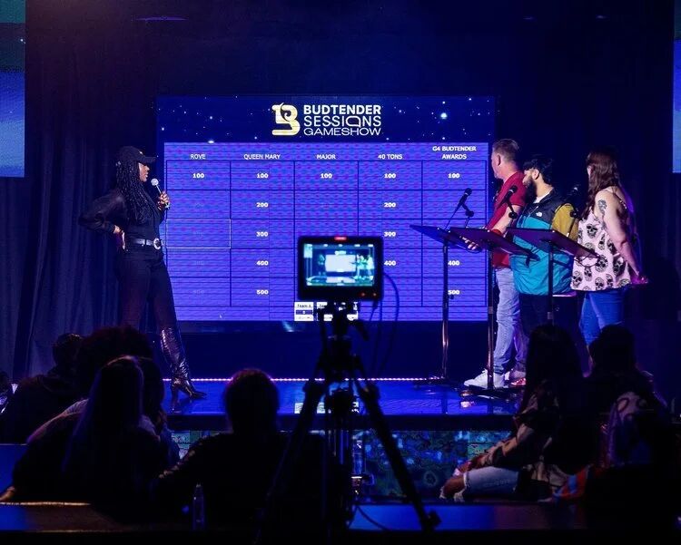 Contestants at podiums for the Budtender Sessions Gameshow