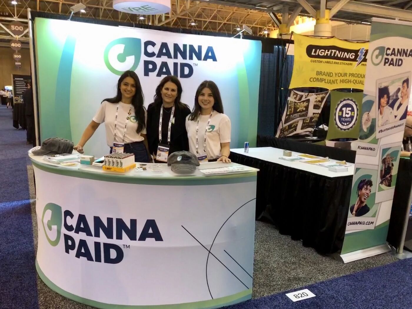 CannaPaid team at their trade-show booth
