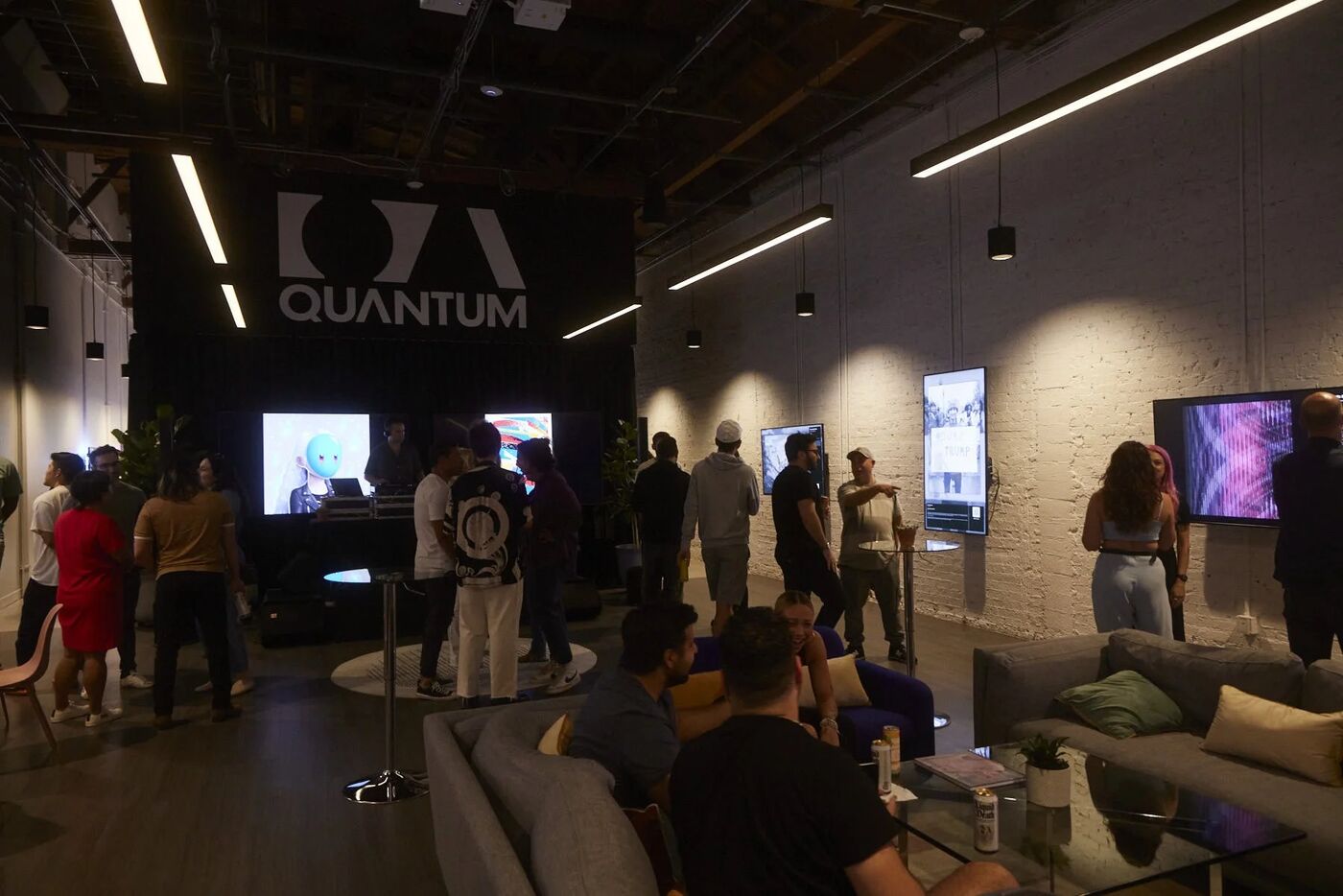 Guests mingling in the Quantum gallery space at Friends of OpenSea