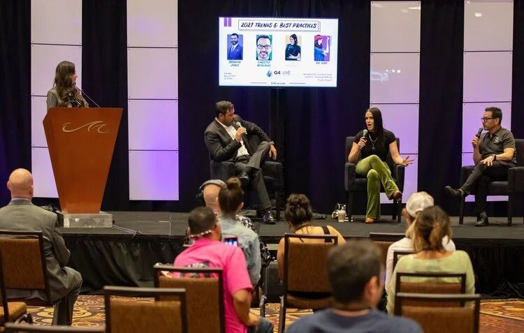 Panel discussion on stage at the G4 Live conference