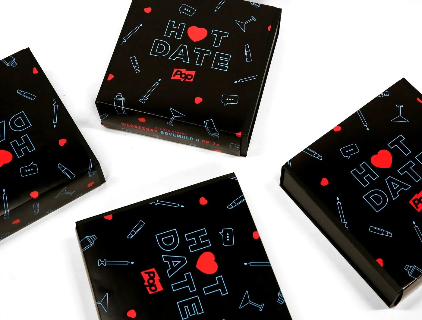 Hot Date press boxes in black with the show's logo pattern