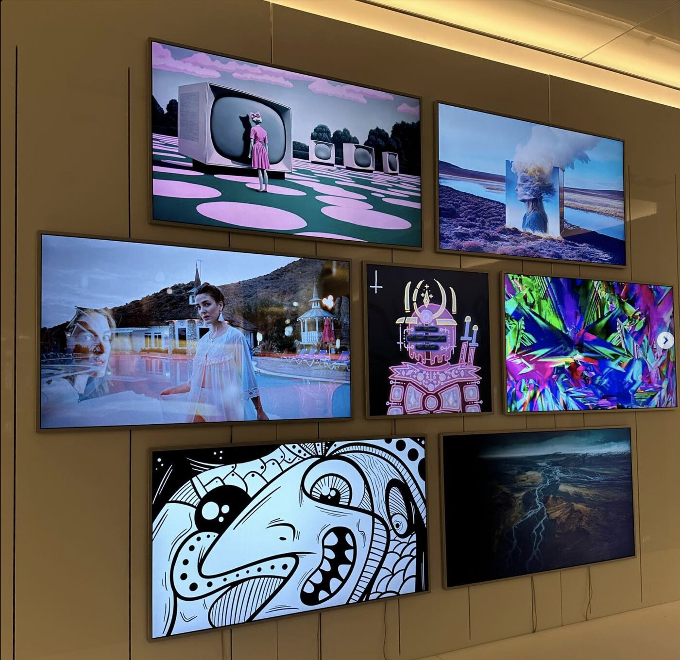 Gallery wall of digital artworks at OpenSea's Pride Perspectives