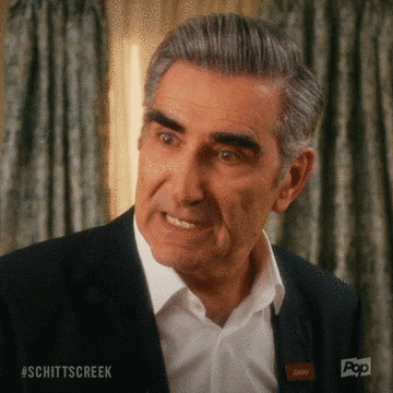 Animated Schitt's Creek GIF of Johnny's wide-eyed reaction