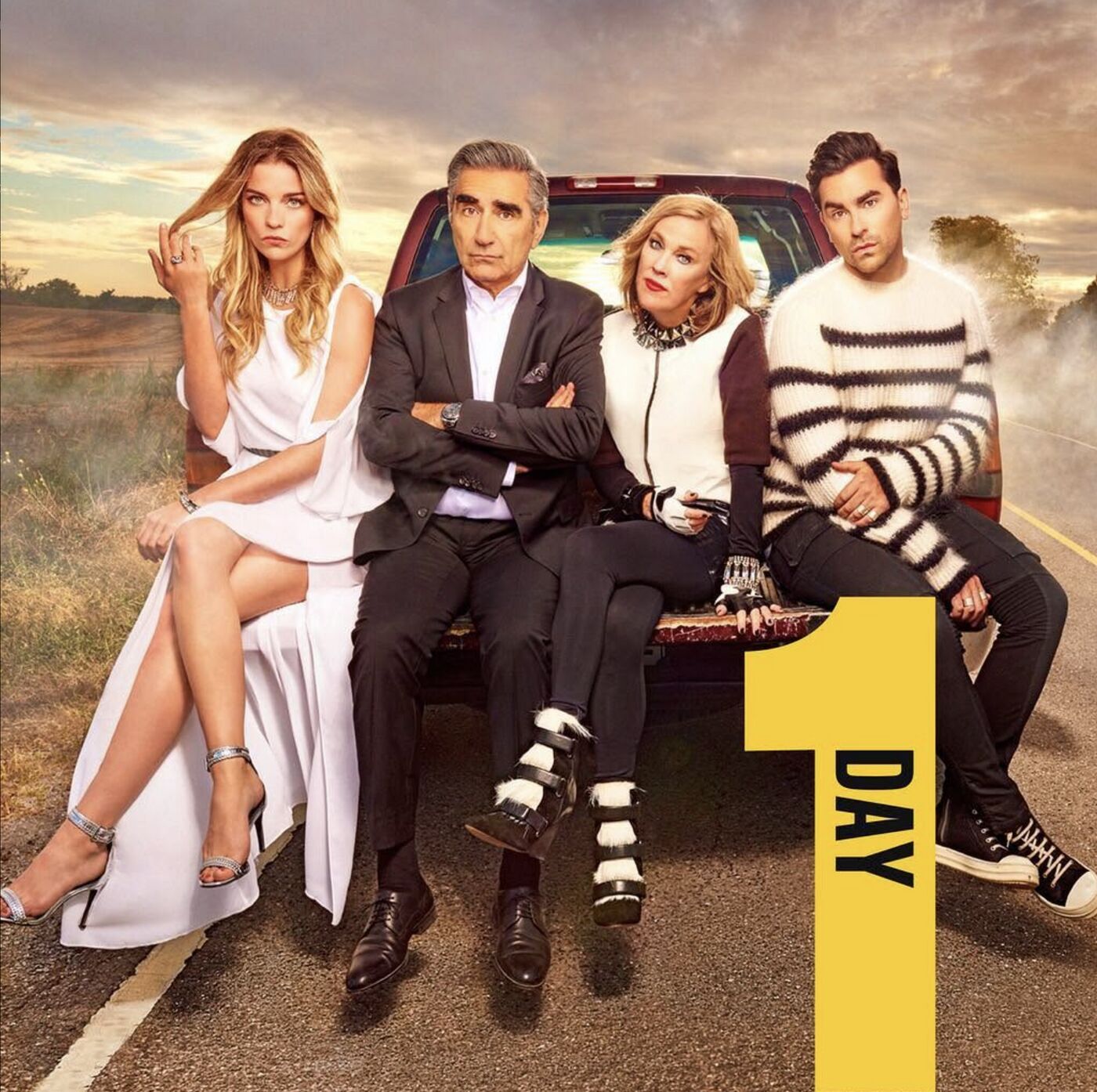 Schitt's Creek countdown: 1 day. The Rose family on a broken-down car by the roadside