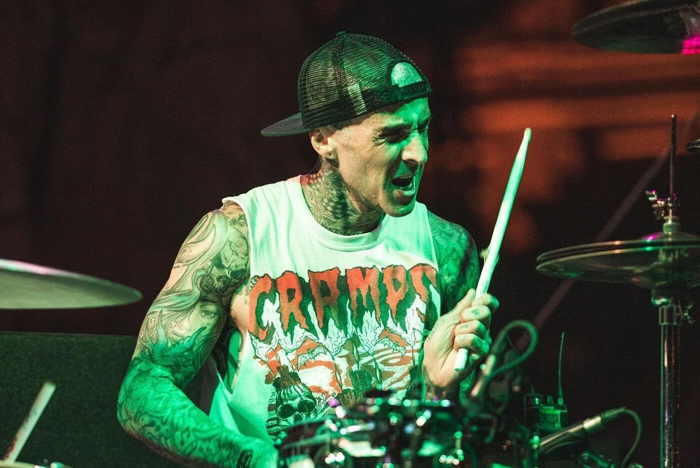 Close-up of Travis Barker drumming at G4 Live