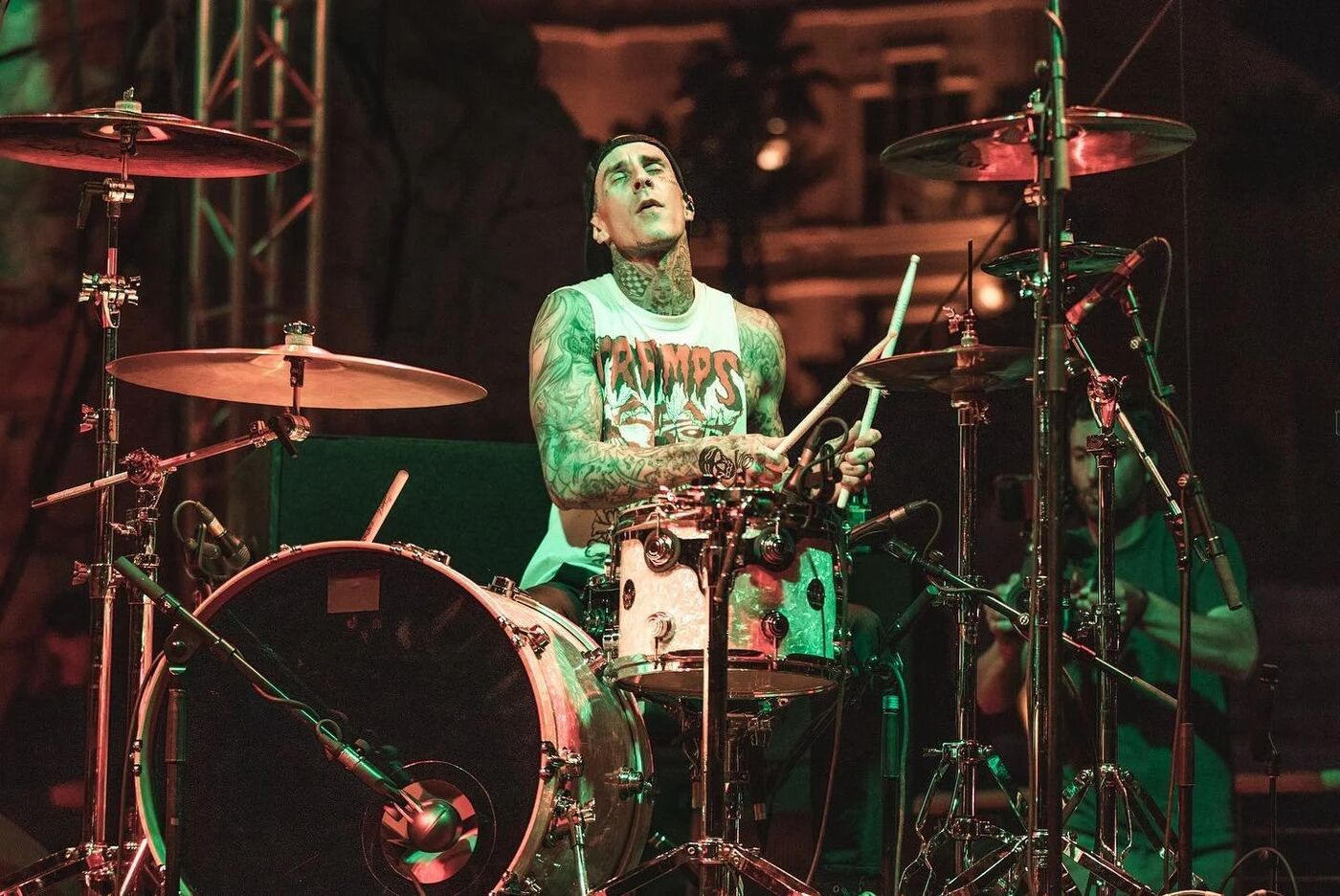 Travis Barker mid-performance on drums at G4 Live