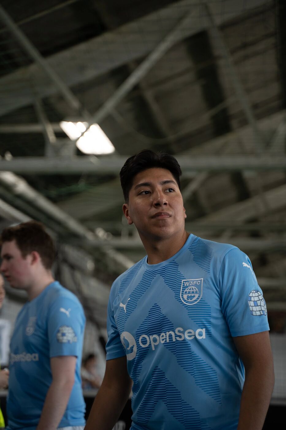 Player in an OpenSea jersey looking across the field