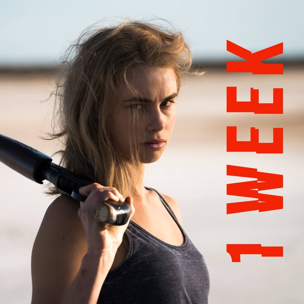 Wolf Creek premiere countdown: 1 week. Eve holding a rifle over her shoulder